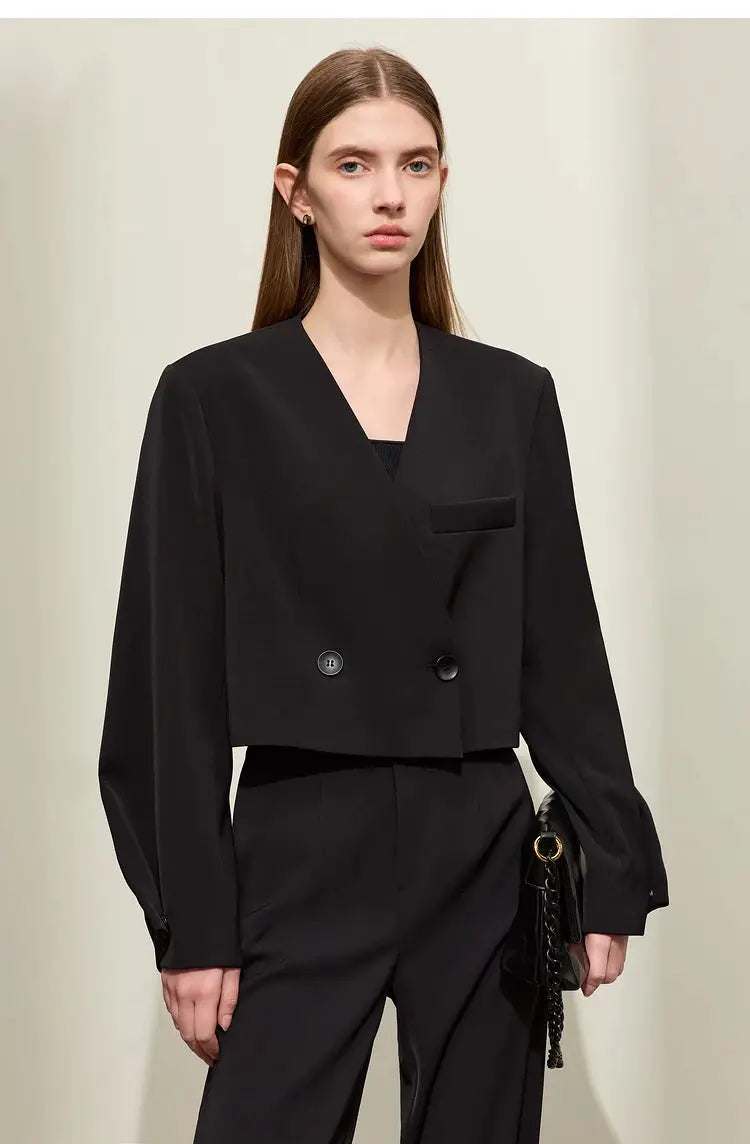 AMII Minimalism black cropped blazer jacket with V-neck and double-breasted front, paired with black tailored pants