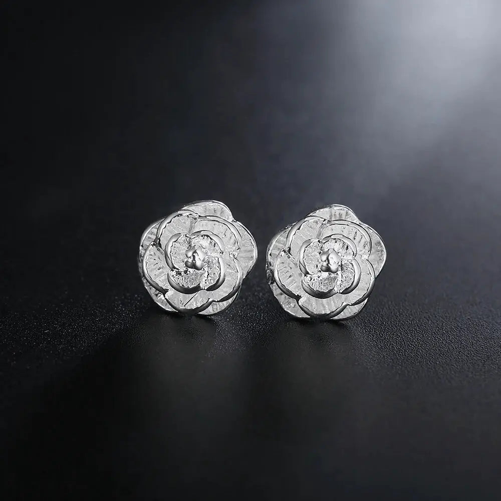 Pair of 10mm sterling silver flower stud earrings by Simples Market