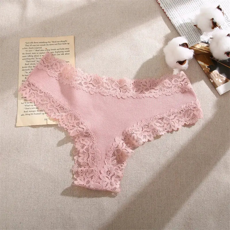 Women’s pink lace-trimmed panties with floral lace edges, ribbed cotton fabric