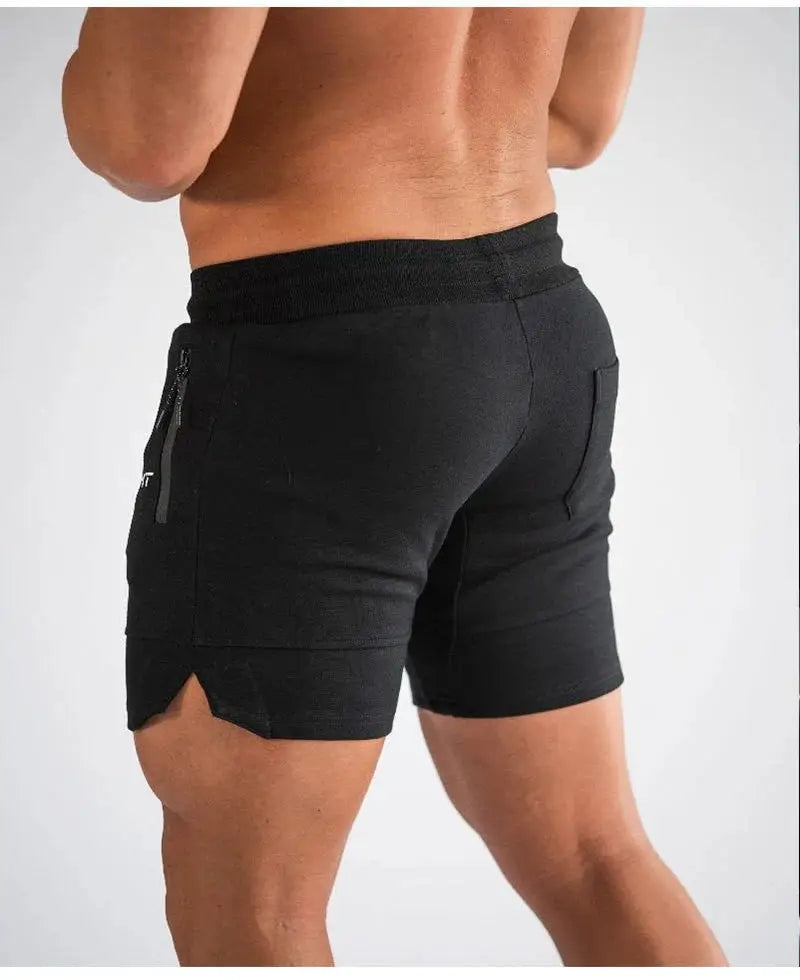 Men's black athletic shorts with zip pocket, elastic waistband, mid-thigh length for running and workouts.