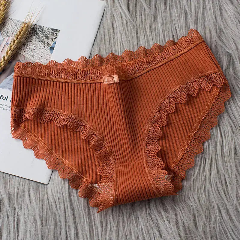 4-pcs lace wavy-trim bikini panties set in rust-orange with ribbed breathable fabric