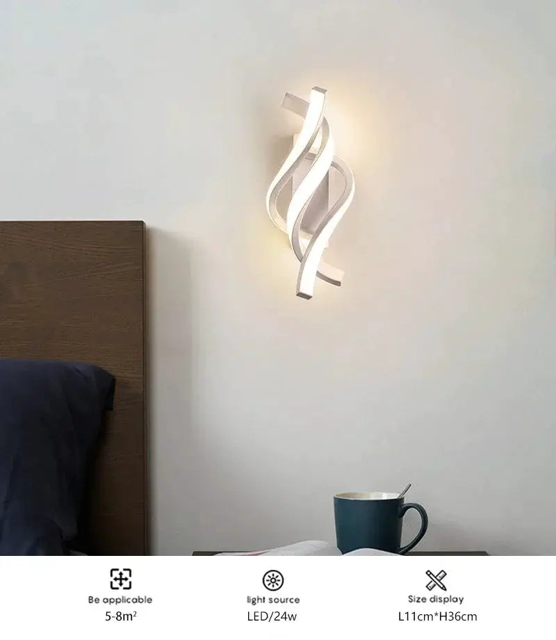 Curved spiral LED wall lamp by Simples Market, white finish, for bedroom bedside lighting.