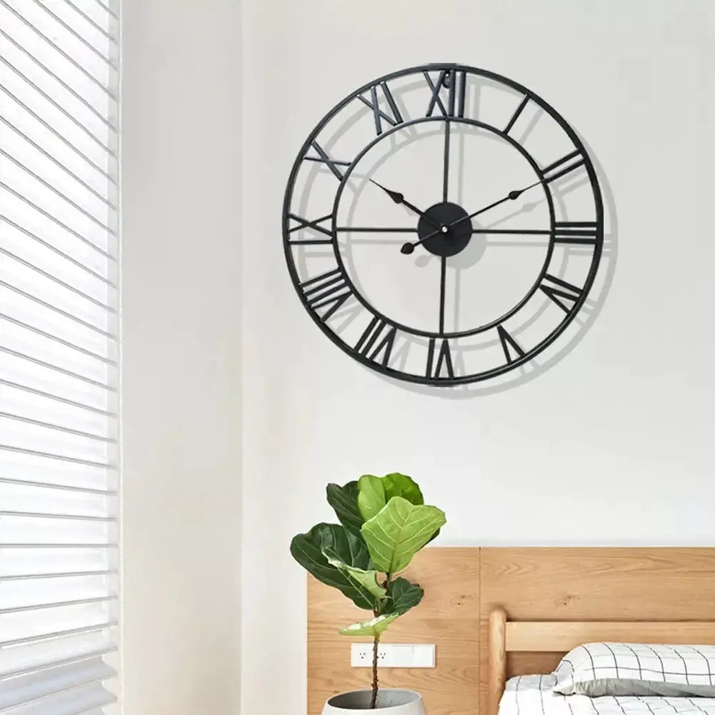 Large black metal wall clock with Roman numerals, open-frame retro design for living room decor