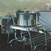 Stainless steel outdoor camping stove with folding rack and cooking pot