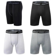 4-pack Pro Combat men's compression shorts in black, dark gray, white, and heather gray with elastic waistband