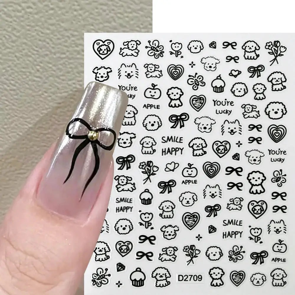 Nail sticker sheet with black line-art cartoon icons (dogs, bows, hearts) for a cute manicure
