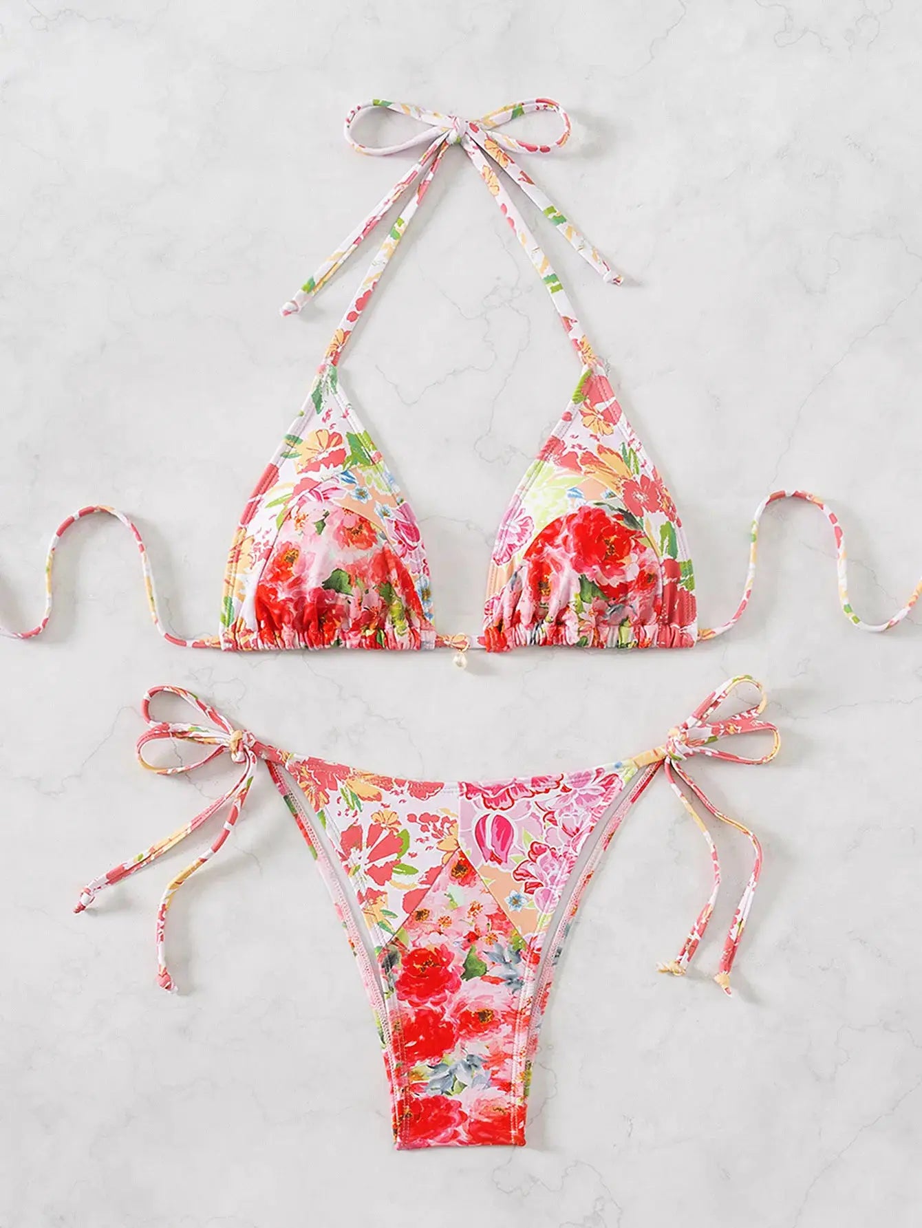 Floral triangle bikini set with push-up top and Brazilian bottoms in pink, red, yellow print (2-piece swimsuit).