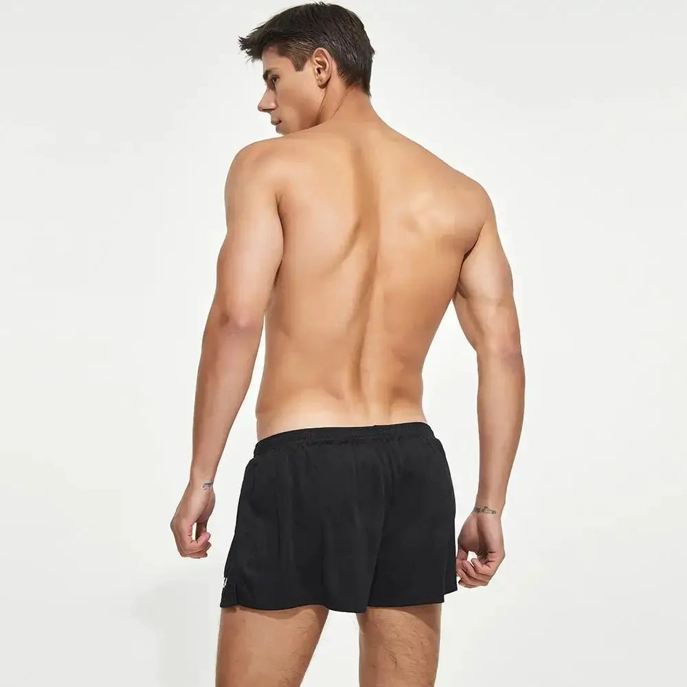 SEOBEAN men's quick-drying loose shorts in black with breathable fabric for gym, fitness, beach and daily wear