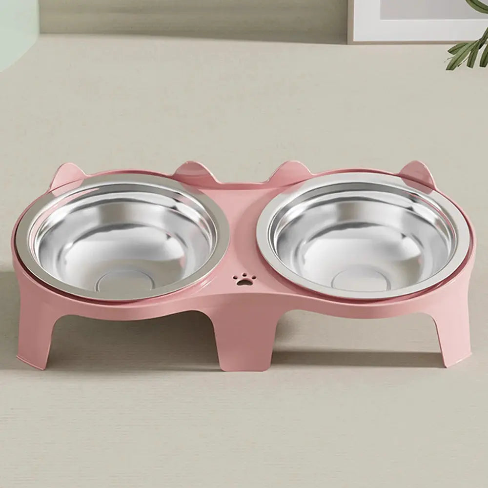 Pink dual stainless steel cat feeding bowls on anti-tip stand; large capacity, 2 bowls.
