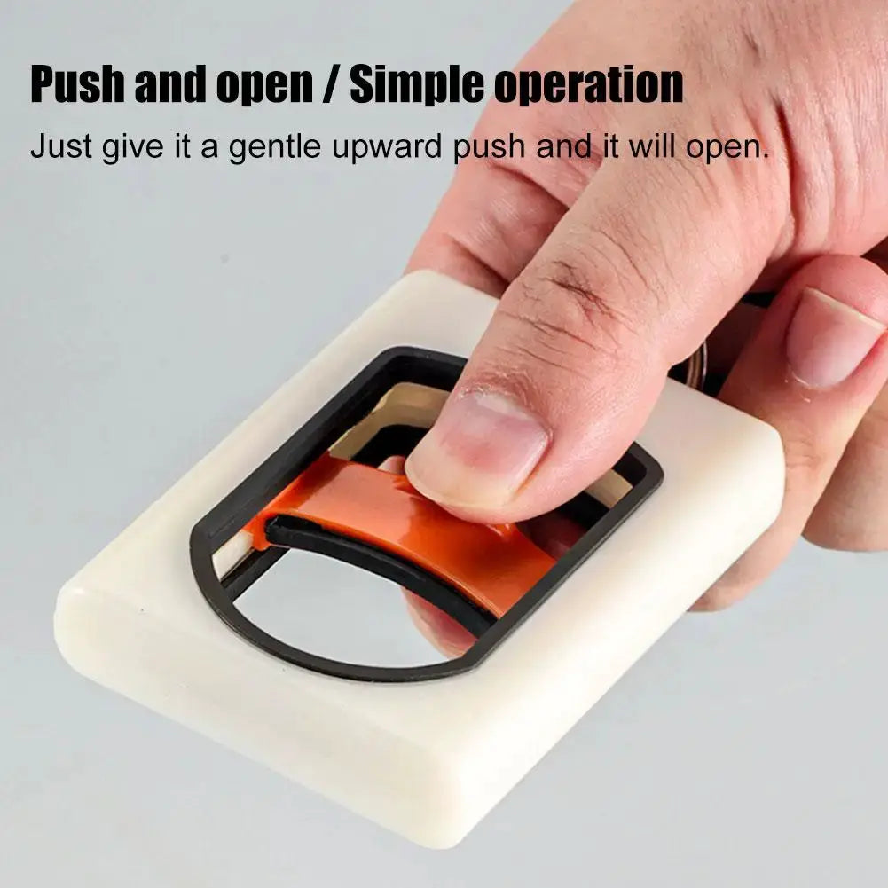 Square Cable Tie Organizer by Simples Market, white plastic case with black frame and orange strap.