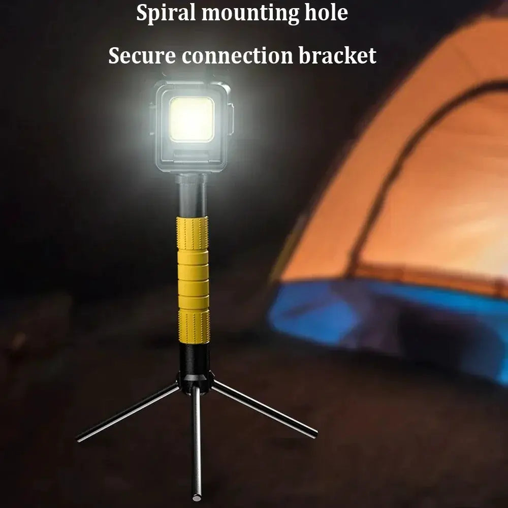 Mini yellow flashlight on a compact tripod with COB LED and foldable side lights