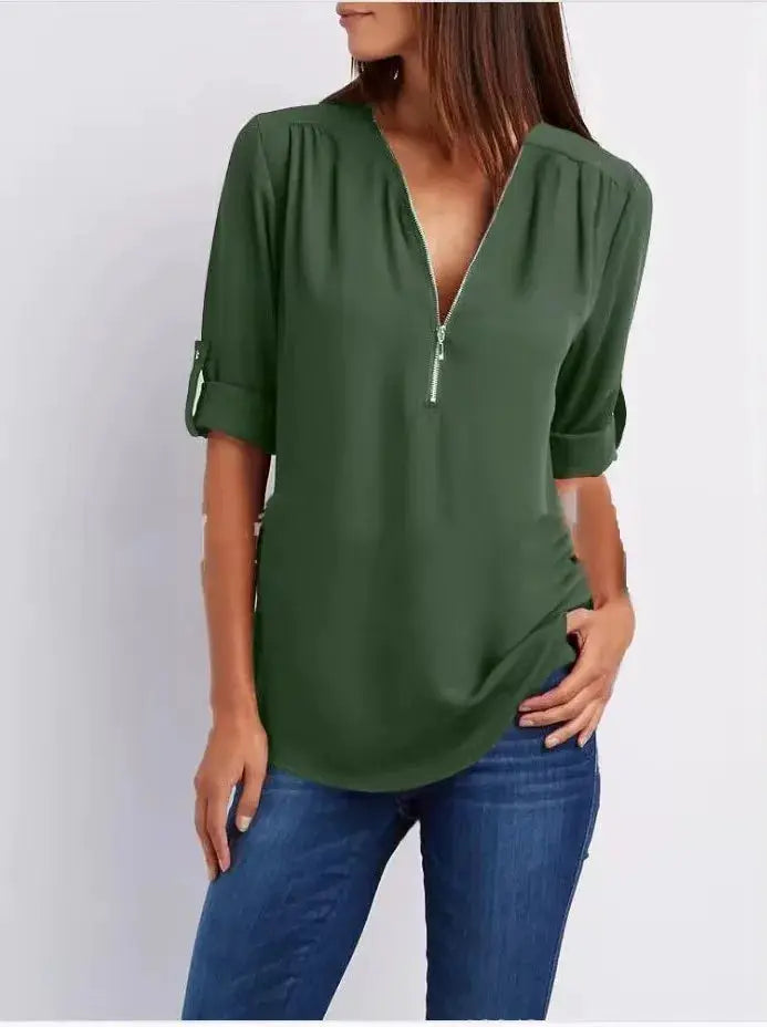 Women's green chiffon blouse with deep V-neck and front zipper, rolled sleeves, loose fit.