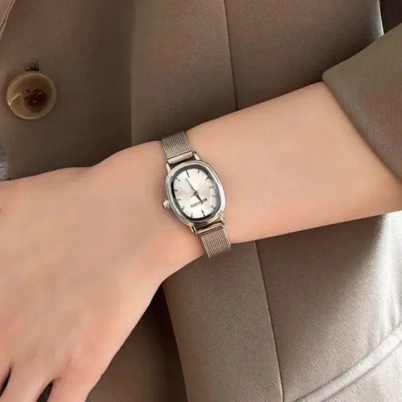 LuxeWear Small Oval Green Dial Stainless Steel Quartz Watch For Women Elegant Everyday Timepiece