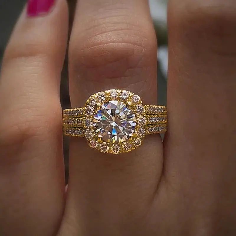 Huitan gold-tone cubic zirconia engagement ring with halo and triple-band pave setting by Simples Market