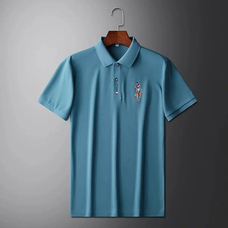 Men's teal polo shirt with short sleeves and embroidered chest logo.