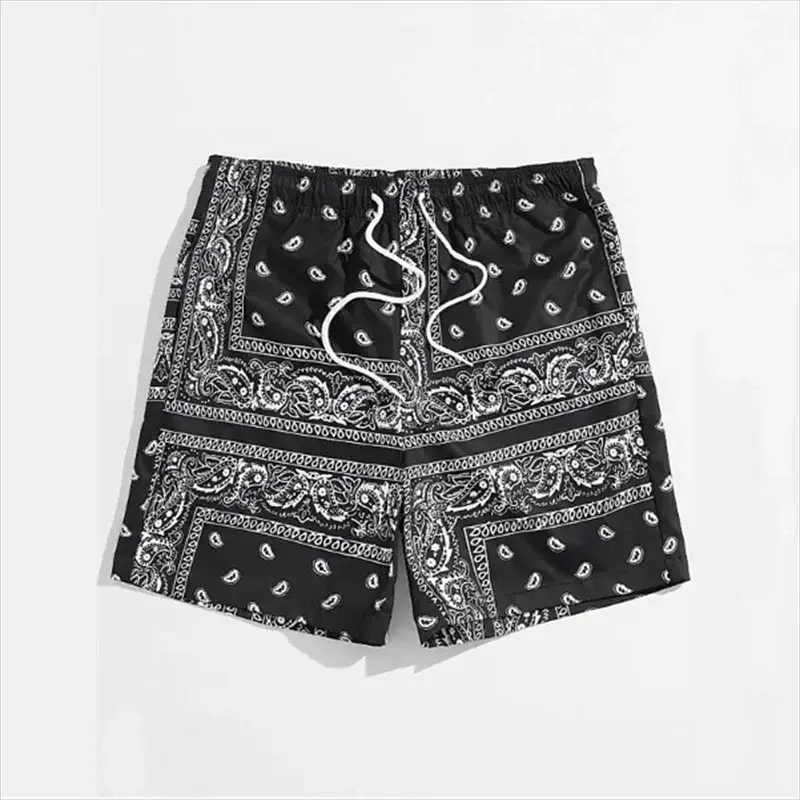 Trend Bandana Graphic Beach Shorts for Men in black with white paisley print, drawstring waist