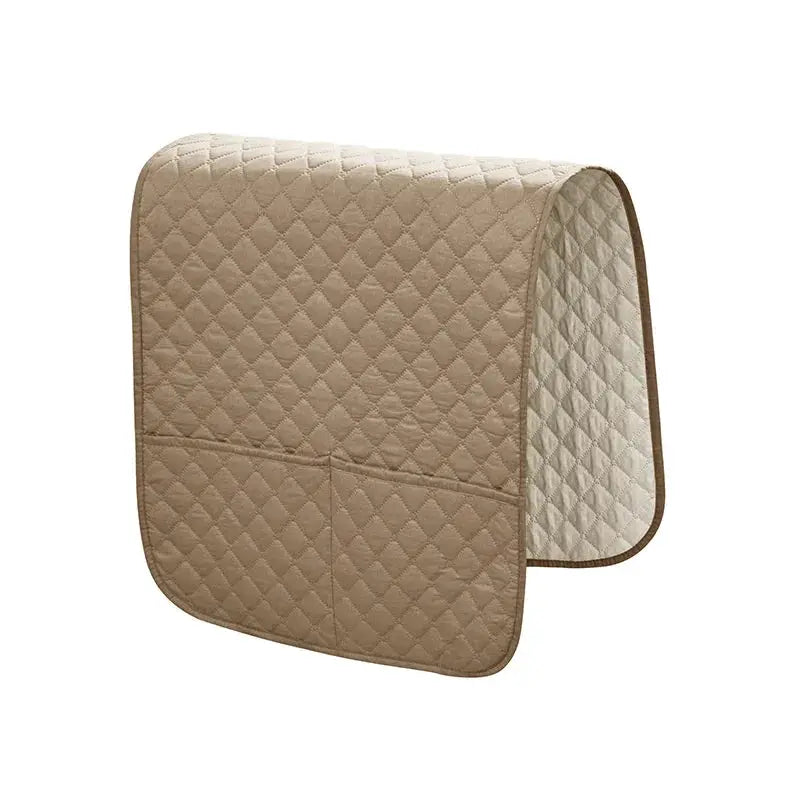 Beige quilted sofa armrest cover with front pockets for remote and cellphone water-repellent slipcover