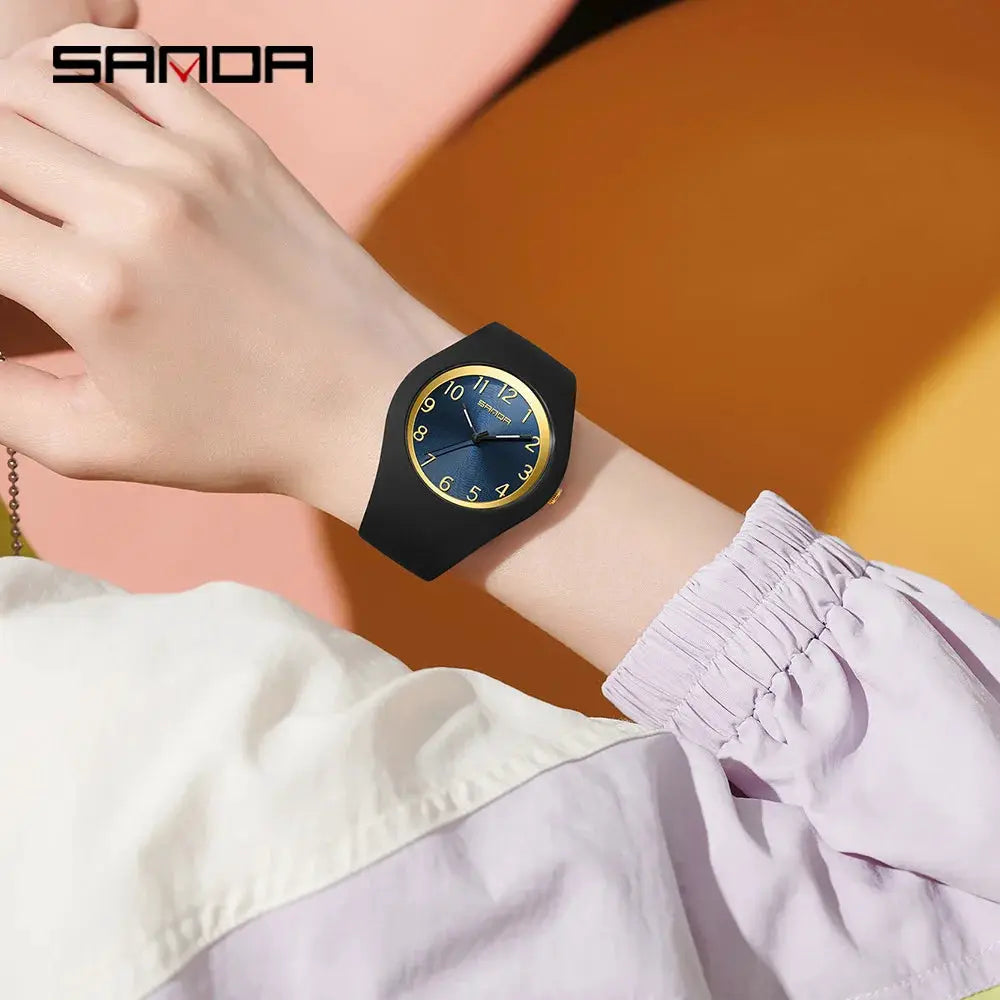 SANDA 6186 simple luxury student quartz watch with blue dial, gold numerals, and black silicone strap