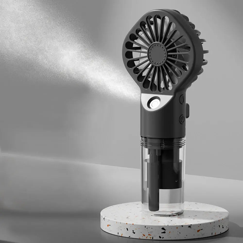 Portable handheld spray fan with mist, Simples Market, black body and transparent water reservoir