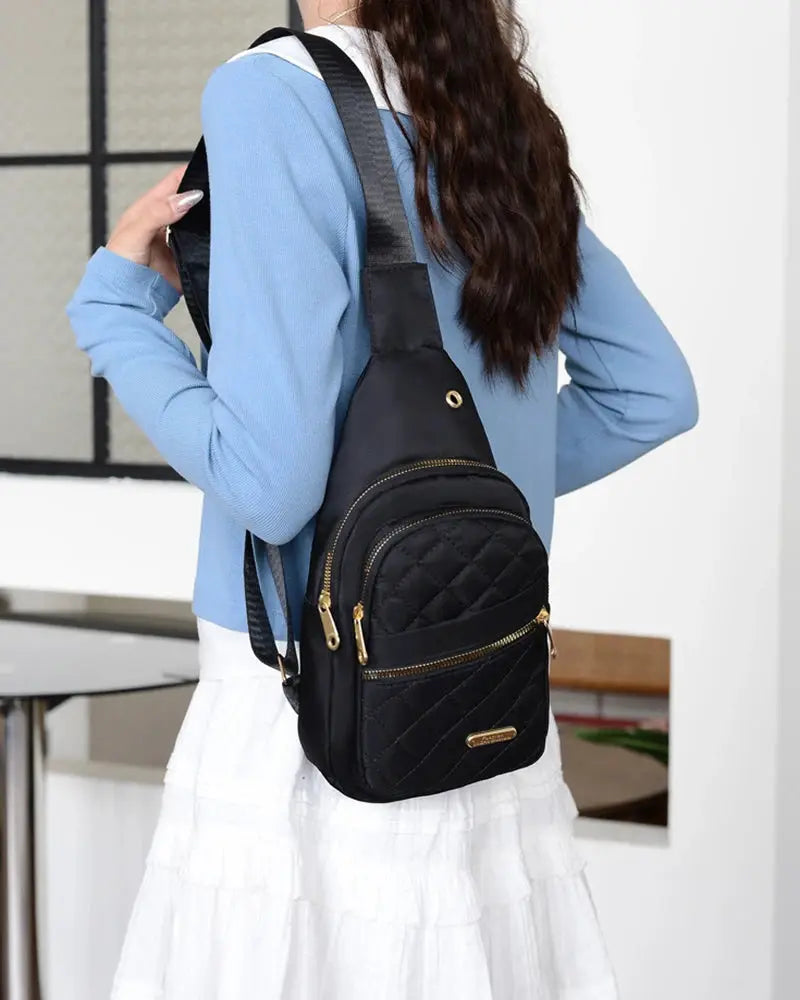Minimalist large-capacity women's chest bag, black quilted exterior with gold zippers, Simples Market