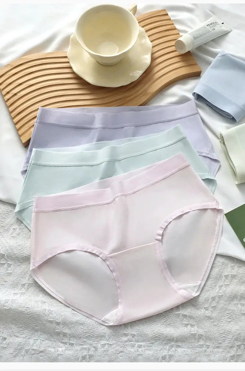 7-piece cotton women’s panties set in pastel colors, low-rise briefs by Simples Market.