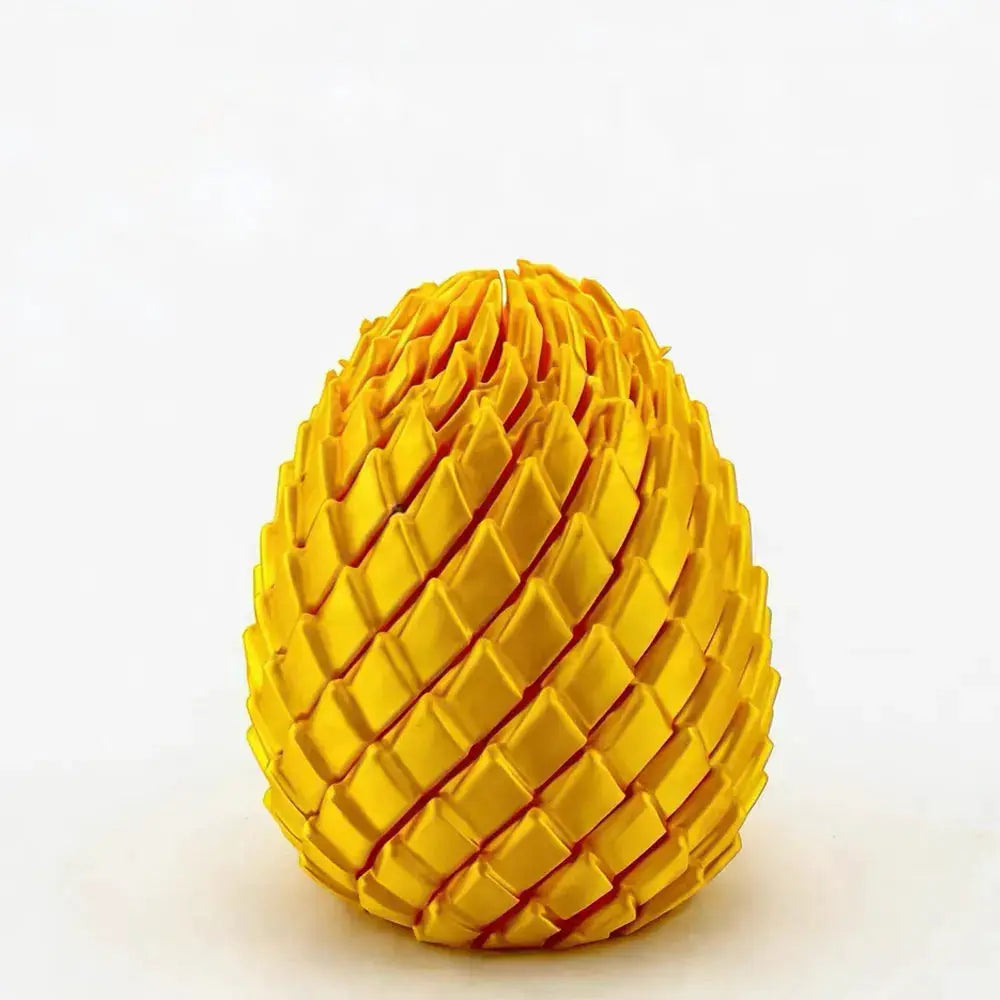 3D-printed dragon egg stress-relief model; deformable yellow twist egg desk ornament