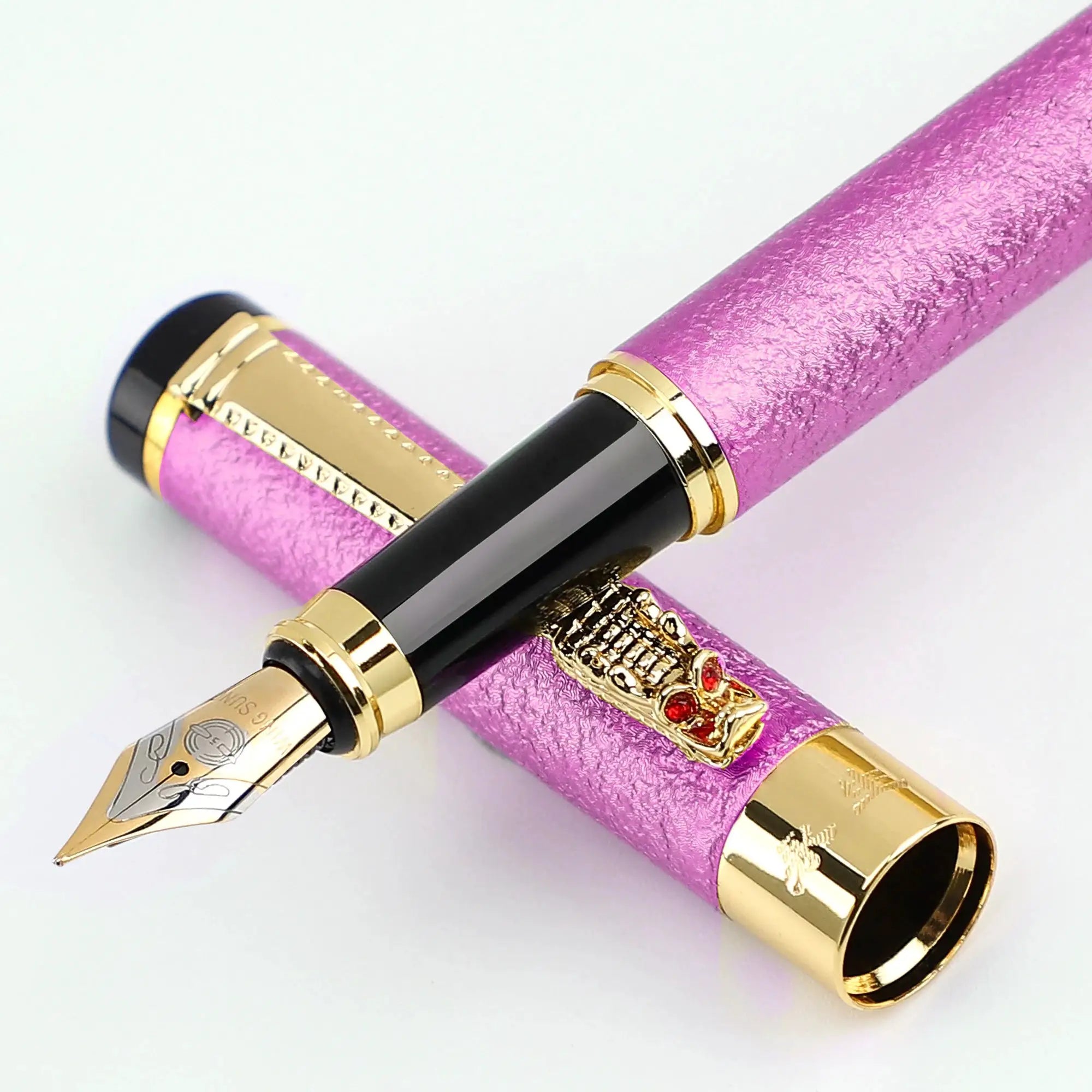 Fountain pen with purple textured body, gold trim and black grip