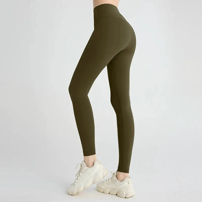 Yoga leggings by Simples Market, olive green, high-waisted, breathable women's athletic pants.