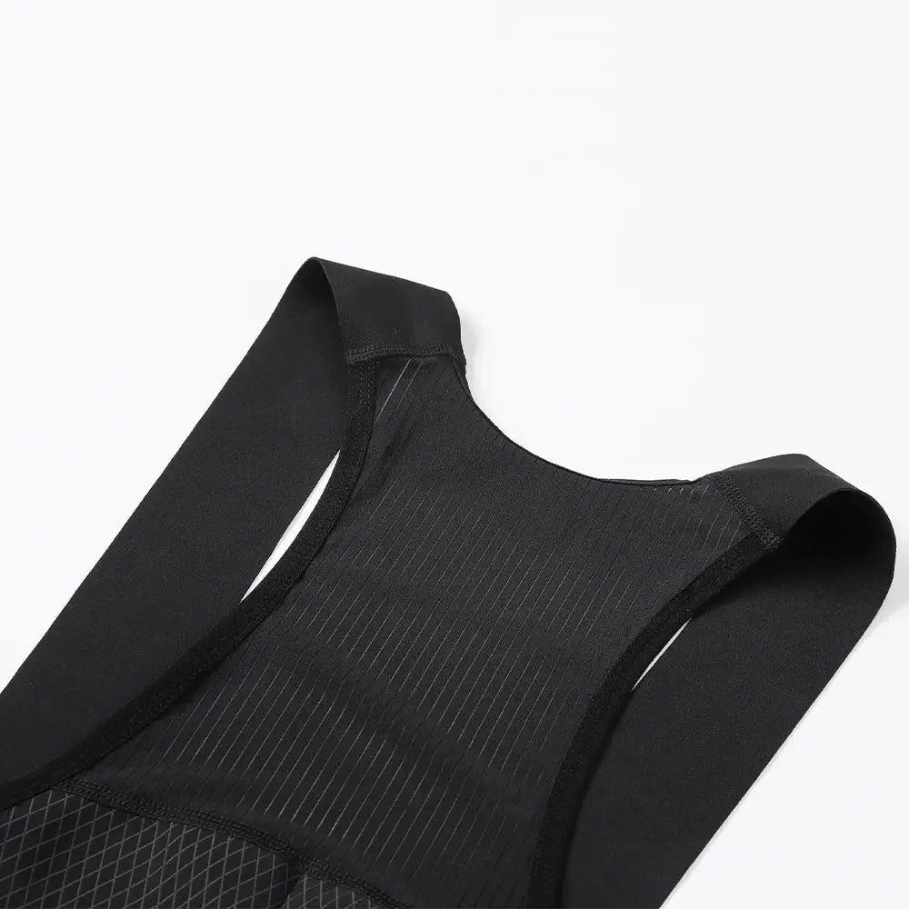 Black cycling bib shorts with wide straps, pinstripe chest panel and diamond-pattern panels