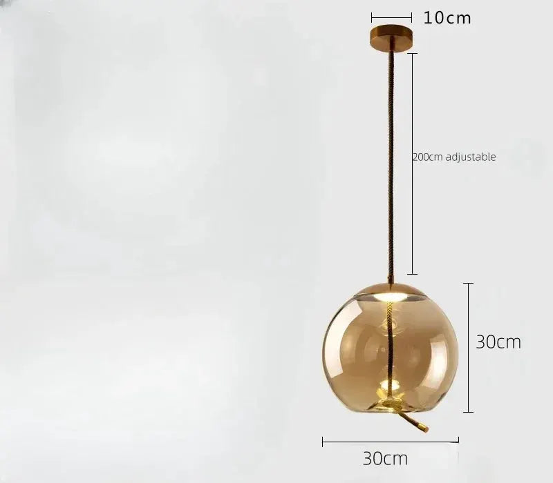 Pendant lamp with amber glass globe on hemp rope, adjustable cord for ceiling mount