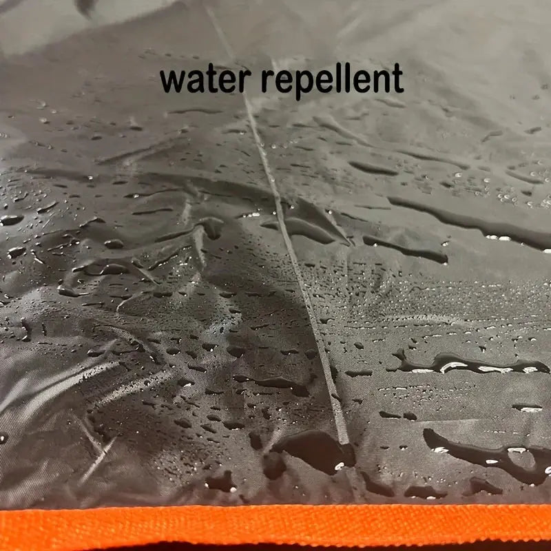 Simples Market waterproof SUV trunk mat; black with orange edge, water-repellent surface.