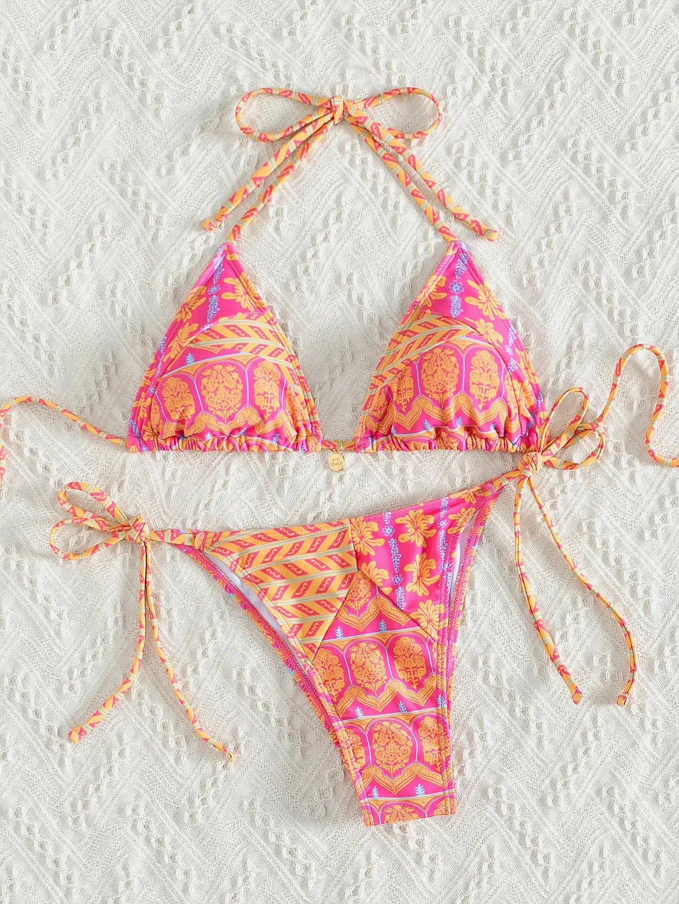 Triangle bikini set by Simples Market in pink floral print with push-up top and Brazilian bottoms
