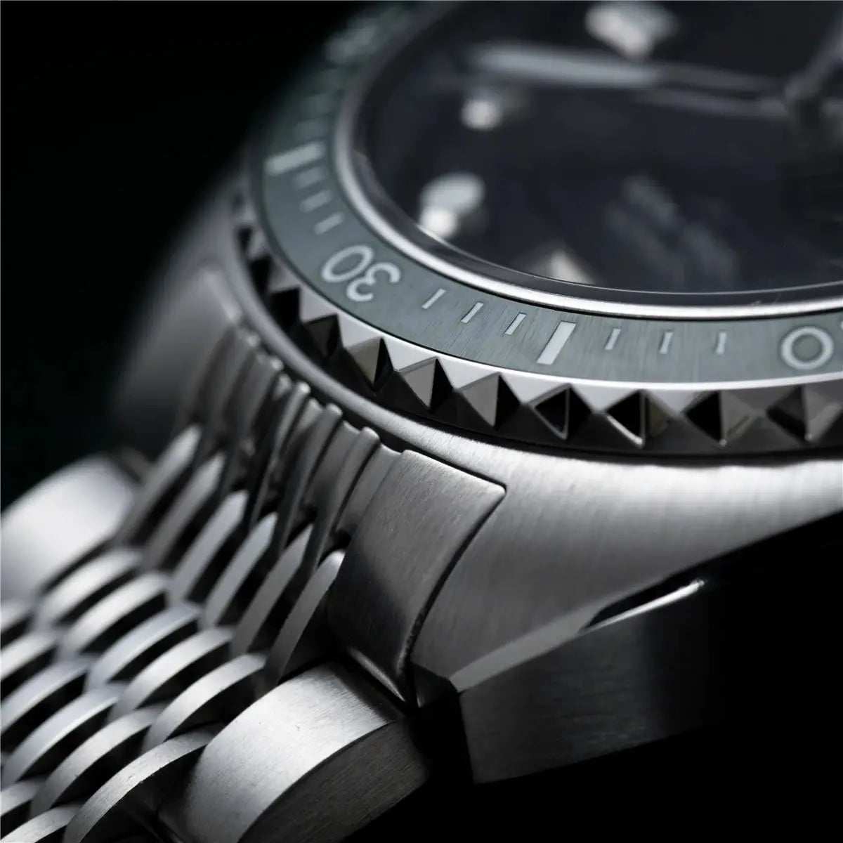 IXDAO IPOSE 2026 men's stainless steel diving watch with gear-like bezel and metal bracelet