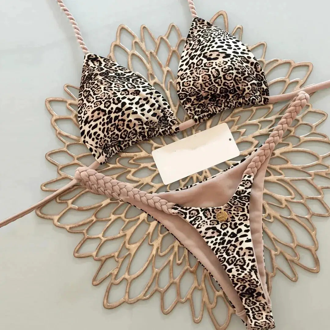 2-piece women's leopard print bikini set with pink braided straps; triangle top and thong bottom