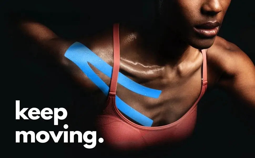 Kinesiology tape on shoulder; blue elastic strips on a dark-skinned athlete wearing a pink sports bra.