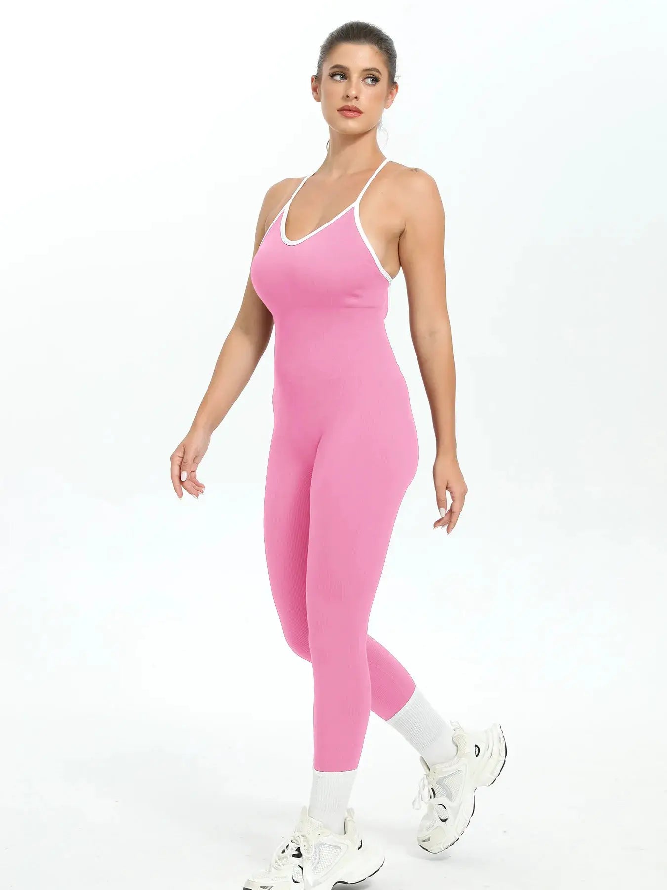 Women pink seamless ribbed jumpsuit with white trim for gym workouts, Simples Market