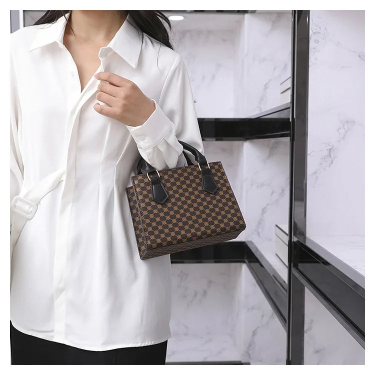 Small square top-handle handbag in brown plaid PU leather with black handles