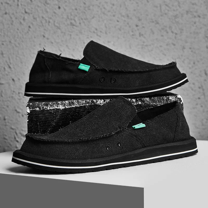 Men's black canvas loafers by Simples Market, breathable low-top casual sneakers with teal accent