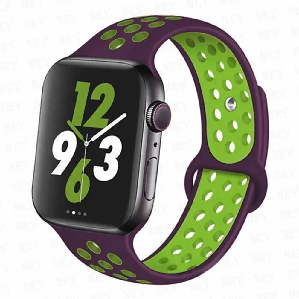 Silicone sport strap for Apple Watch by Simples Market, purple exterior with lime-green perforated interior, fits 38/40–45mm