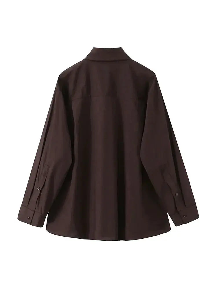 Brown women's collared button-up shirt with long sleeves, back view