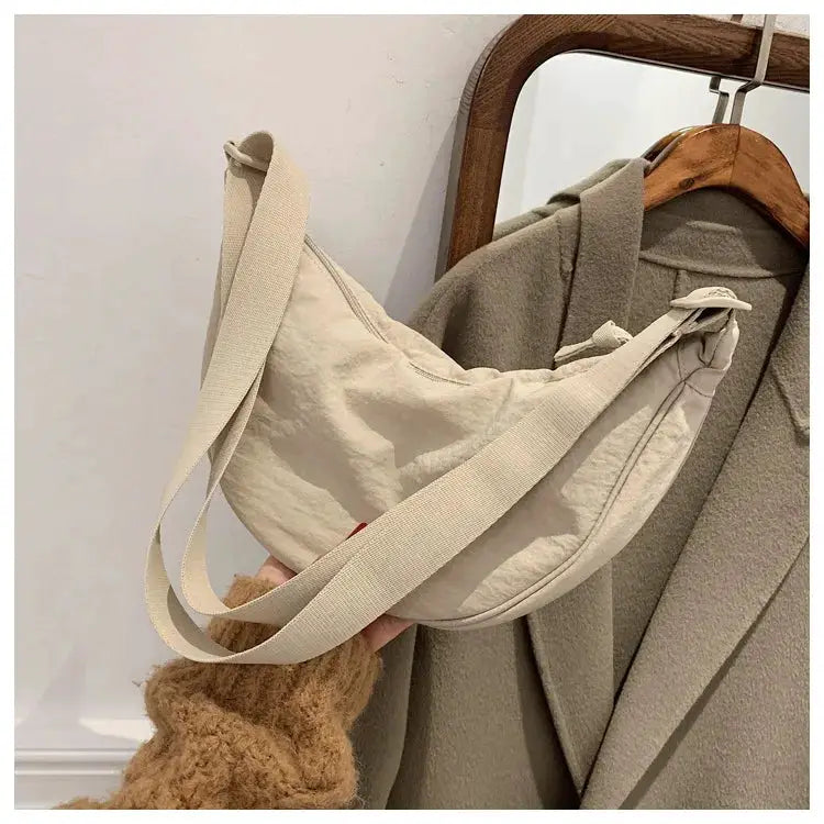 Nylon hobo crossbody bag, cream beige color with adjustable strap