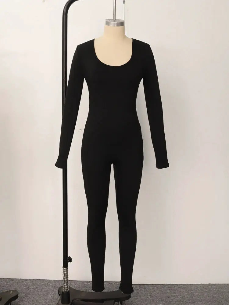 Women's black solid-color long-sleeve skinny jumpsuit on mannequin