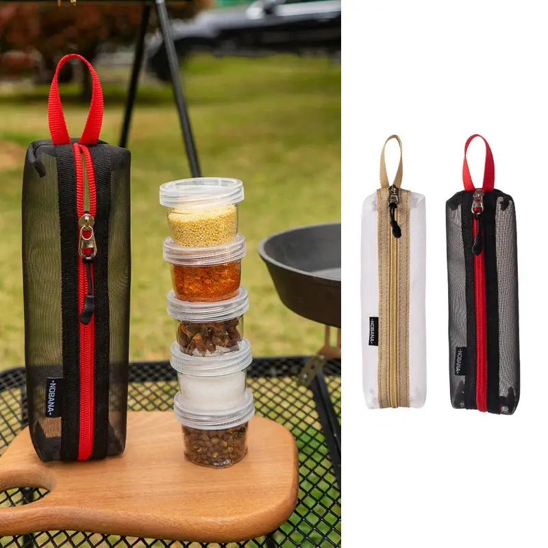 Simples Market portable camping spice kit; five clear spice bottles in a zippered bag with a red carrying loop