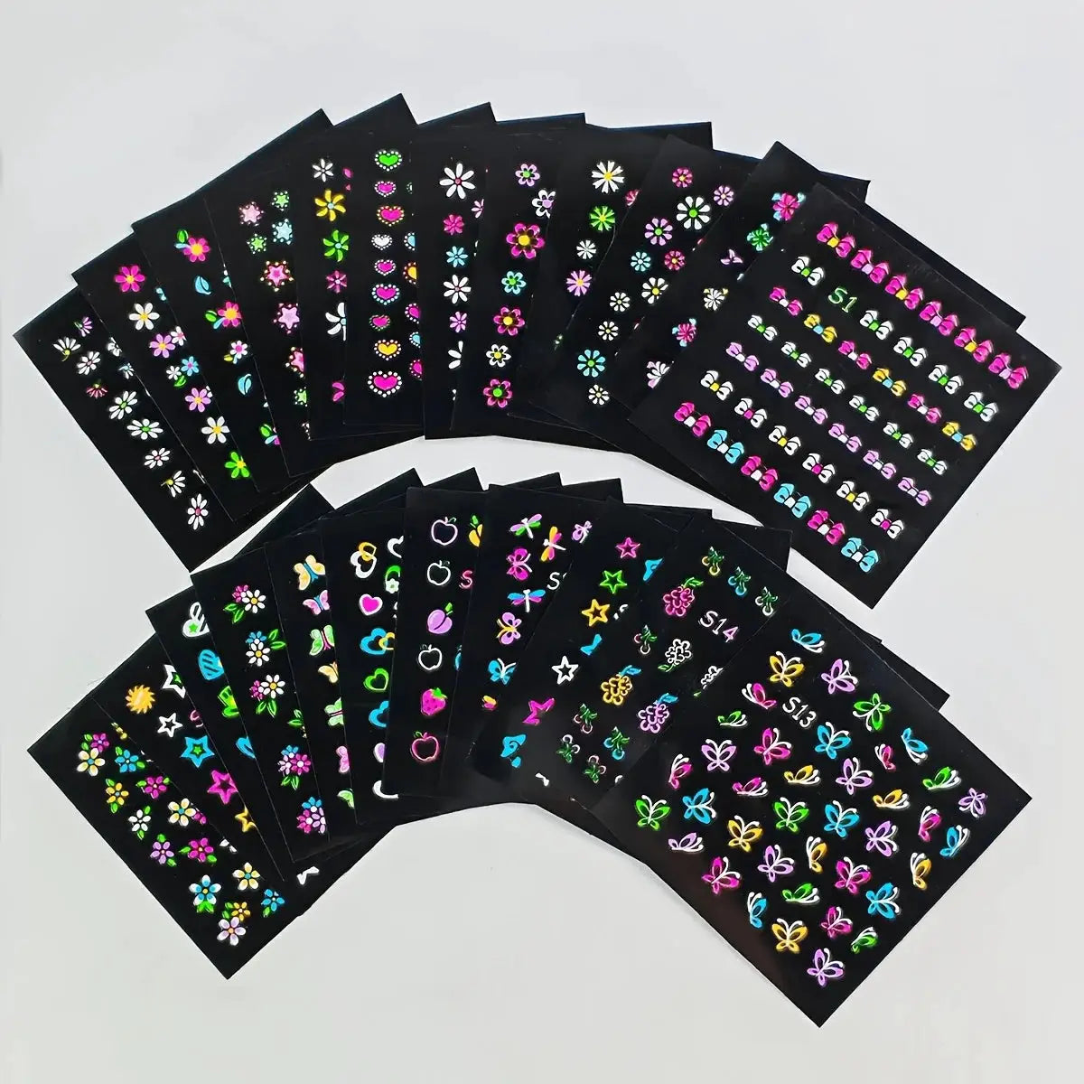 Nail sticker sheets set by Simples Market, 30 neon glow-in-the-dark designs with butterflies and hearts.