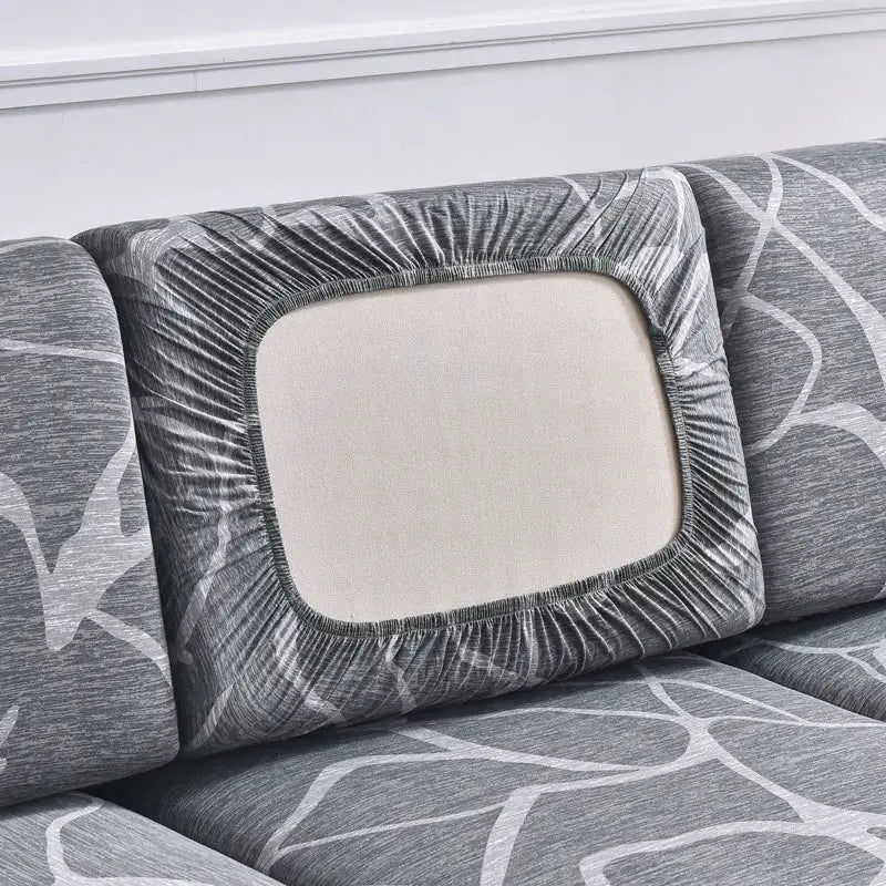 Stretch couch cushion slipcover in grey with elastic edges for anti-slip protection