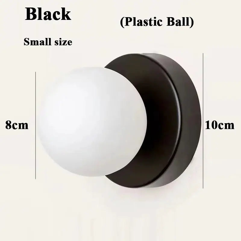Macaron Soft Style small wall lamp with black iron base and white plastic ball shade