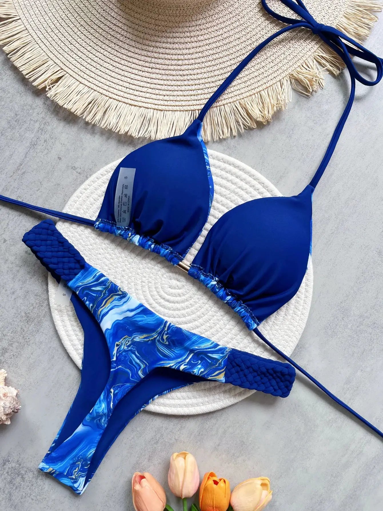 Simples Market RUOTONSEPT blue halter bikini two-piece set with high-cut thong bottom and marbled panel.