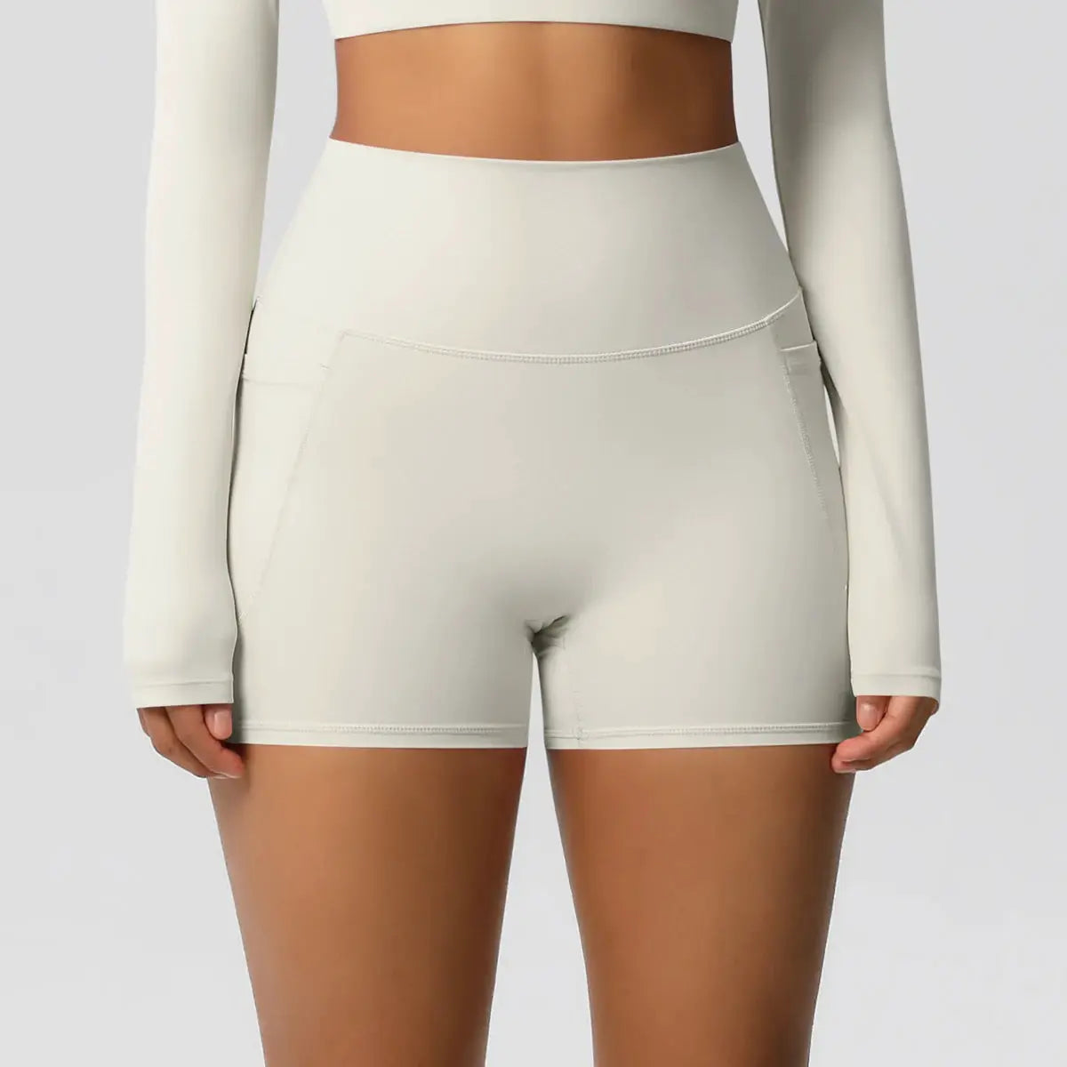 Women’s pocketed high-waist yoga shorts by Simples Market, beige, quick-dry, squat-proof gym shorts