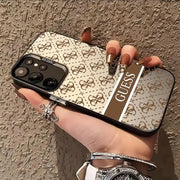 GUESS phone case for Samsung Galaxy S20–S26 series, silver with beige monogram pattern and brown center stripe