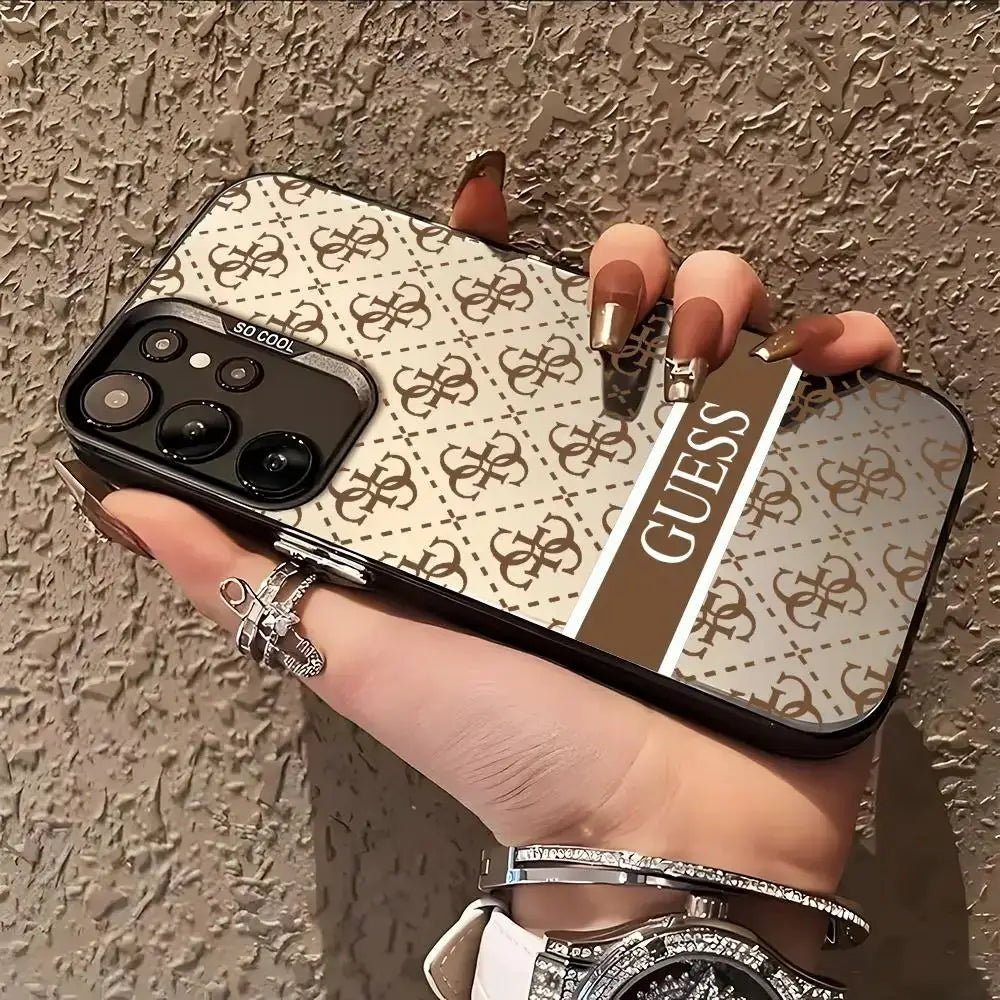 GUESS phone case for Samsung Galaxy S20–S26 series, silver with beige monogram pattern and brown center stripe
